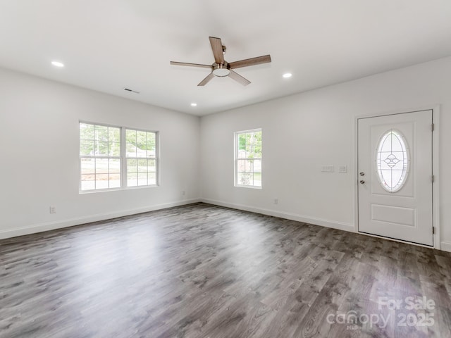 foyer entrance featuring ceiling fan, wood finished floors, baseboards, and recessed lighting