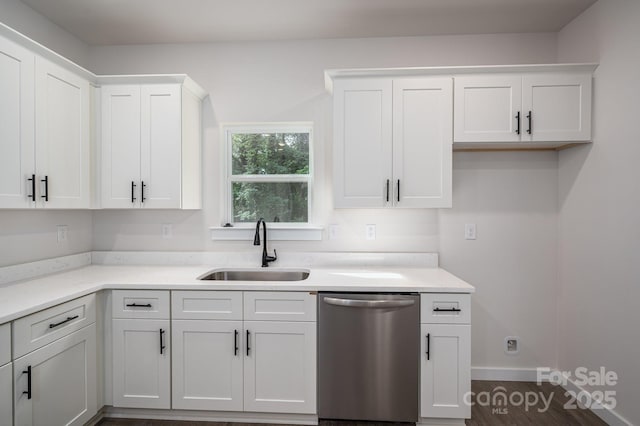 1941 32nd St NE, Hickory, NC 28601 - kitchen with dishwasher, a sink, white cabinets, and light countertops