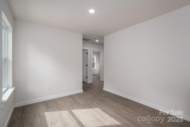 1941 32nd St NE, Hickory, NC 28601 - unfurnished room with wood finished floors, baseboards, and recessed lighting