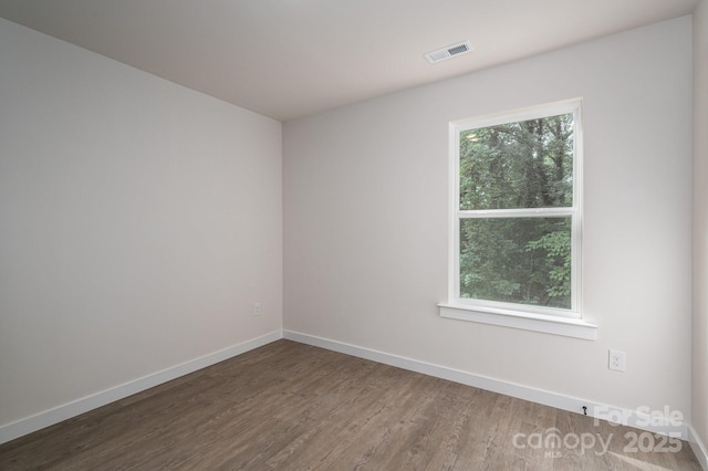 1941 32nd St NE, Hickory, NC 28601 - unfurnished room featuring baseboards and wood finished floors