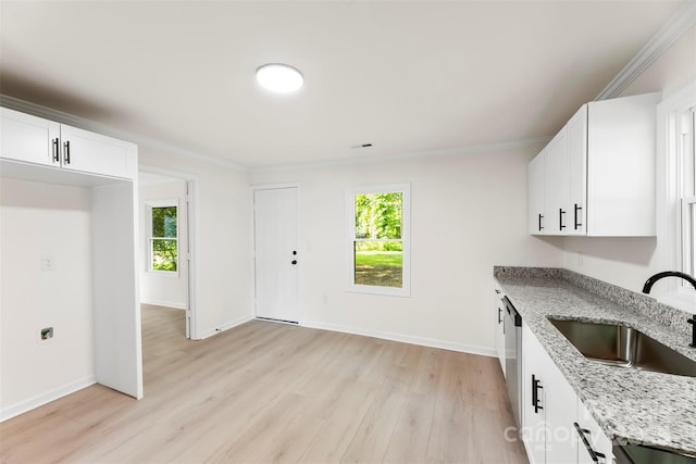 1155 Cedar Grove Ln, Rock Hill, SC 29732 - kitchen with a sink, light stone counters, light wood-style flooring, baseboards, and white cabinets