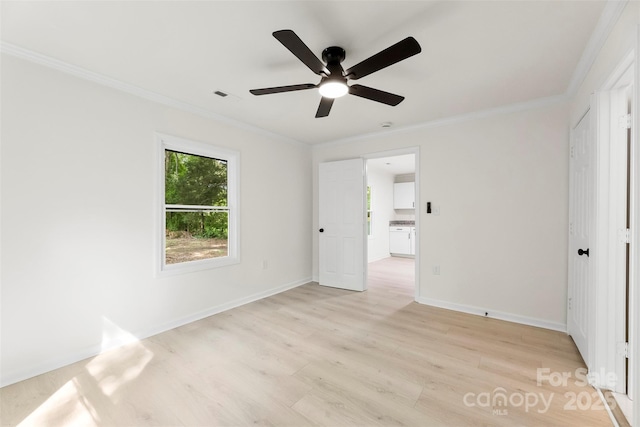 1155 Cedar Grove Ln, Rock Hill, SC 29732 - empty room featuring crown molding, light wood-type flooring, a ceiling fan, and baseboards