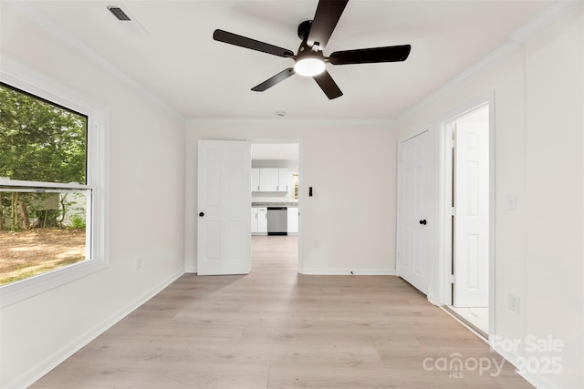 1155 Cedar Grove Ln, Rock Hill, SC 29732 - empty room featuring crown molding, light wood-style flooring, a ceiling fan, and baseboards