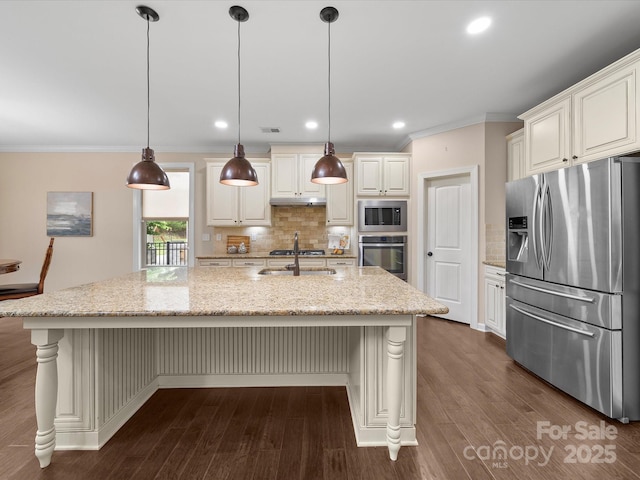 1190 Arges River Dr, Fort Mill, SC 29715 - kitchen featuring stainless steel appliances, ornamental molding, tasteful backsplash, a sink, and dark wood-type flooring