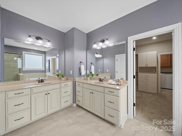 1190 Arges River Dr, Fort Mill, SC 29715 - bathroom featuring two vanities, tile patterned flooring, and an enclosed shower