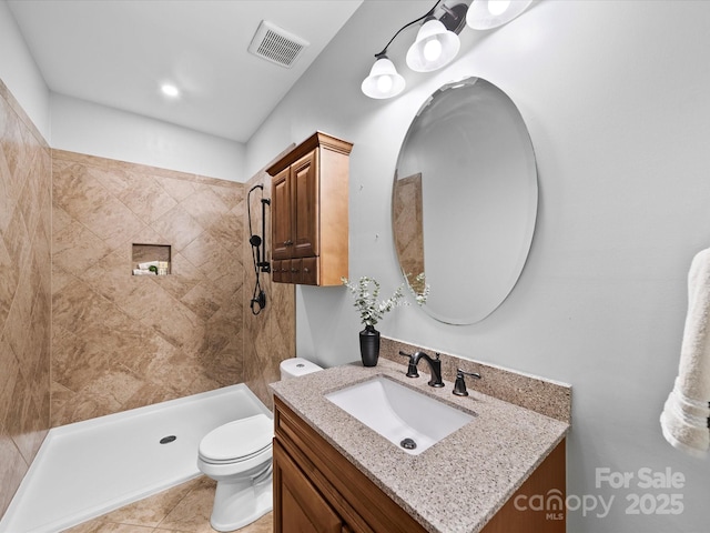1190 Arges River Dr, Fort Mill, SC 29715 - bathroom with vanity, toilet, a tile shower, and tile patterned flooring