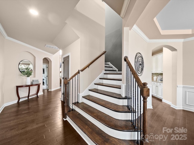 1190 Arges River Dr, Fort Mill, SC 29715 - staircase featuring arched walkways, hardwood / wood-style floors, and ornamental molding