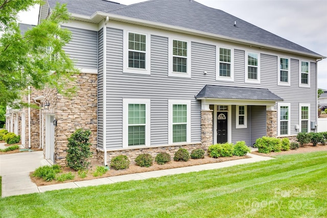 5836 Clan Maclaine Dr, Charlotte, NC 28278 - view of front of property featuring stone siding and a front yard