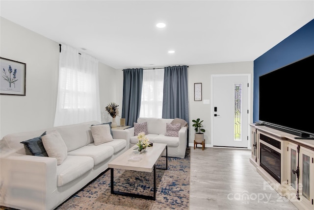4108 Mellon Rd, Matthews, NC 28104 - living area featuring plenty of natural light, wood finished floors, recessed lighting, and baseboards