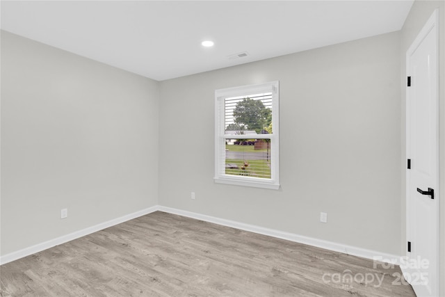4108 Mellon Rd, Matthews, NC 28104 - unfurnished room with light wood-type flooring, baseboards, and recessed lighting