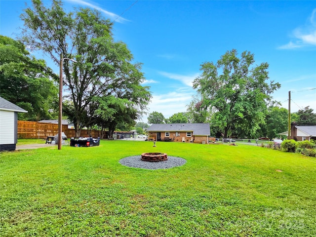 4108 Mellon Rd, Matthews, NC 28104 - view of yard featuring a fire pit