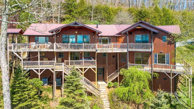 2399 El Miner Dr, Mars Hill, NC 28754 - back of property with a metal roof and stairway