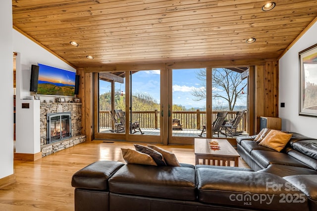 2399 El Miner Dr, Mars Hill, NC 28754 - living room featuring wooden ceiling, vaulted ceiling, a fireplace, recessed lighting, and wood finished floors
