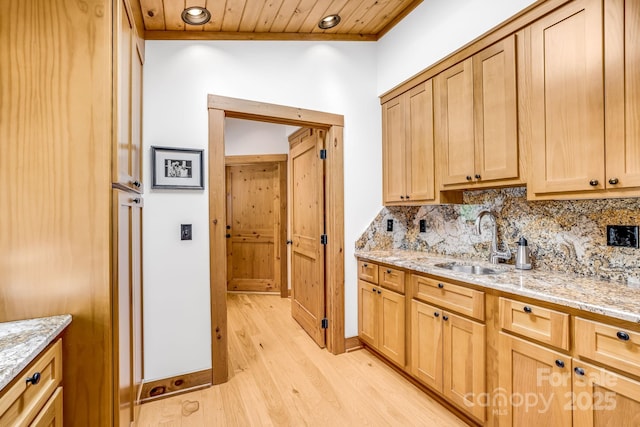 2399 El Miner Dr, Mars Hill, NC 28754 - kitchen with backsplash, light wood finished floors, wooden ceiling, light stone countertops, and light brown cabinets