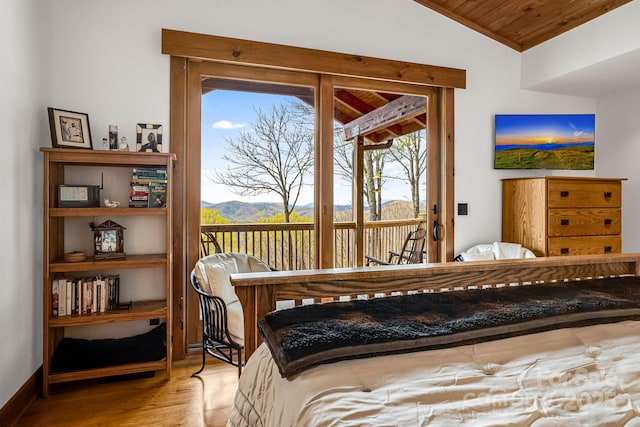 2399 El Miner Dr, Mars Hill, NC 28754 - bedroom with wood finished floors, access to outside, vaulted ceiling, and wooden ceiling