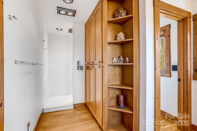 2399 El Miner Dr, Mars Hill, NC 28754 - hallway with built in features and light wood finished floors