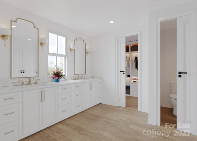4995 Wildlife Ln Unit 1, Sherrills Ford, NC 28673 - bathroom with wood finished floors, double vanity, toilet, and recessed lighting
