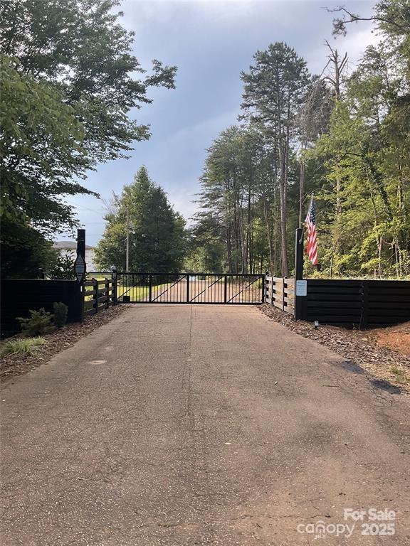 4995 Wildlife Ln Unit 1, Sherrills Ford, NC 28673 - view of road featuring a gate