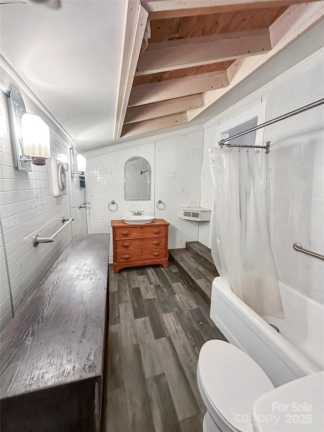 204 N Gaston St, Kings Mountain, NC 28086 - bathroom with toilet, wood finished floors, vanity, and shower / bath combo with shower curtain