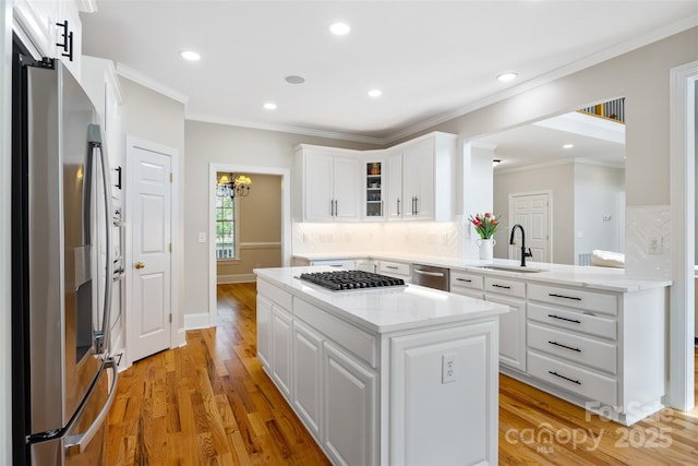6409 Barkley Farm Rd, Huntersville, NC 28078 - kitchen with stainless steel appliances, a sink, backsplash, white cabinets, and glass insert cabinets