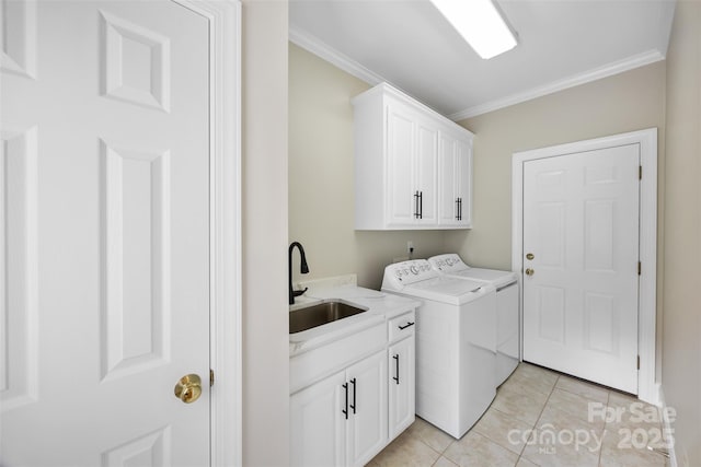6409 Barkley Farm Rd, Huntersville, NC 28078 - laundry area with cabinet space, washing machine and dryer, crown molding, and light tile patterned floors