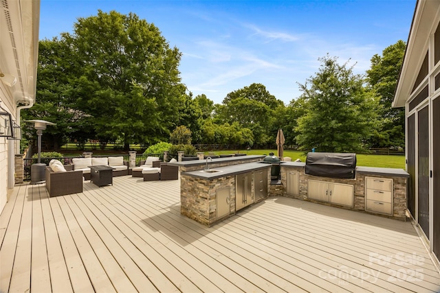 6409 Barkley Farm Rd, Huntersville, NC 28078 - wooden deck featuring an outdoor living space with a fire pit, a sink, and view of scattered trees