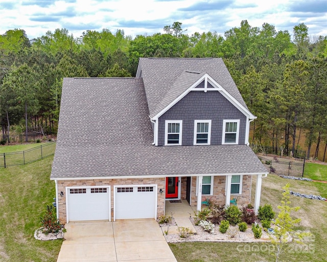 10100 Jack Nicklaus Dr, Lancaster, SC 29720 - view of front of property featuring a shingled roof, stone siding, concrete driveway, and a porch
