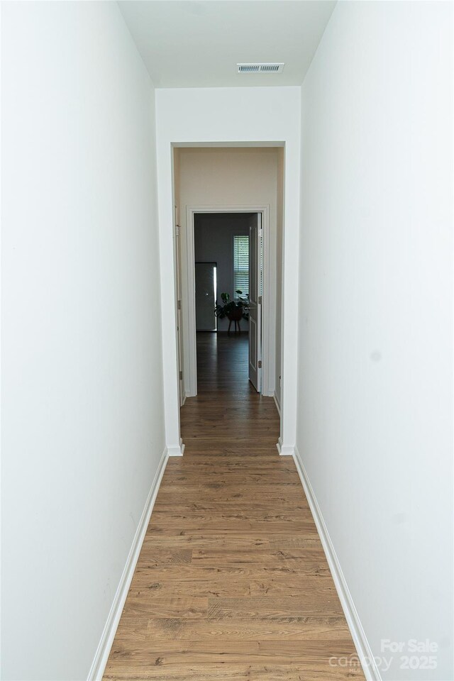 10100 Jack Nicklaus Dr, Lancaster, SC 29720 - corridor with light wood finished floors and baseboards