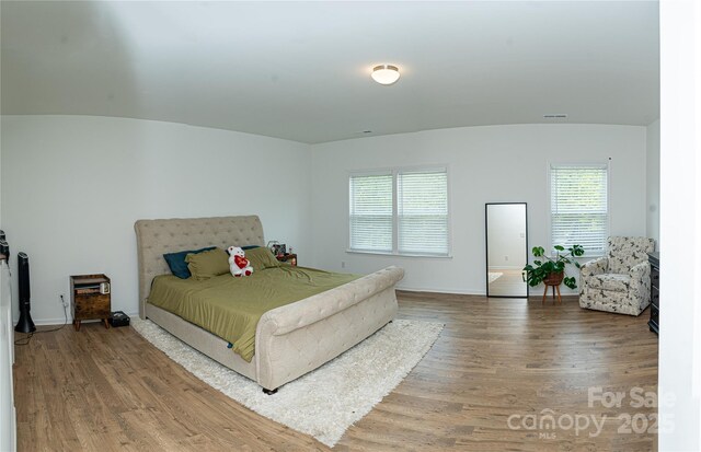 10100 Jack Nicklaus Dr, Lancaster, SC 29720 - bedroom with wood finished floors and baseboards