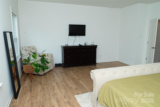 10100 Jack Nicklaus Dr, Lancaster, SC 29720 - bedroom featuring wood finished floors and baseboards