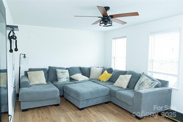 10100 Jack Nicklaus Dr, Lancaster, SC 29720 - living area featuring a ceiling fan and light wood-style floors