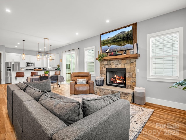 20 Phillip Ln, Arden, NC 28704 - living area featuring a fireplace, light wood finished floors, baseboards, and recessed lighting