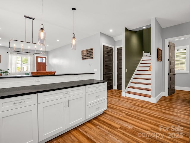 20 Phillip Ln, Arden, NC 28704 - kitchen featuring light wood-style flooring, white cabinetry, dark countertops, and recessed lighting