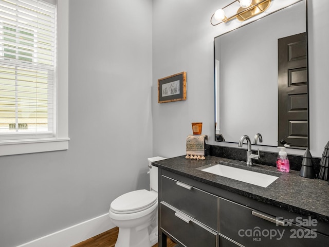 20 Phillip Ln, Arden, NC 28704 - bathroom featuring toilet, vanity, and wood finished floors