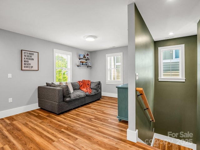 20 Phillip Ln, Arden, NC 28704 - living area with healthy amount of natural light, baseboards, and light wood-style flooring