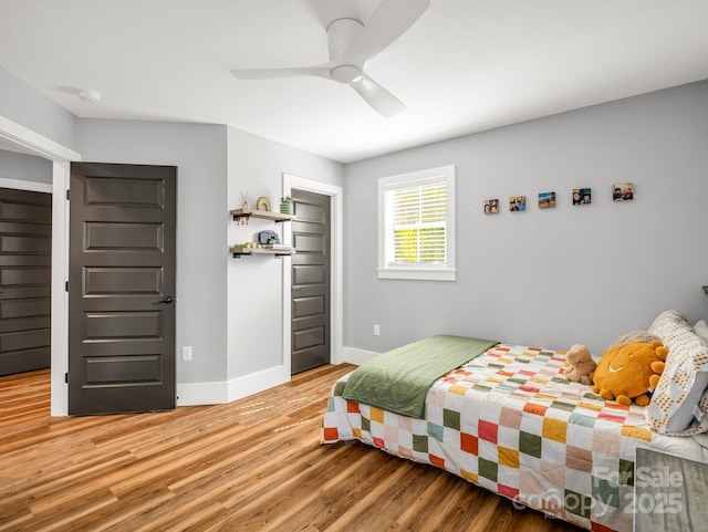 20 Phillip Ln, Arden, NC 28704 - bedroom featuring baseboards, light wood-type flooring, and ceiling fan
