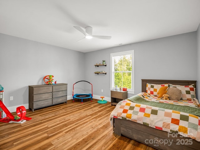 20 Phillip Ln, Arden, NC 28704 - bedroom featuring wood finished floors, baseboards, and a ceiling fan