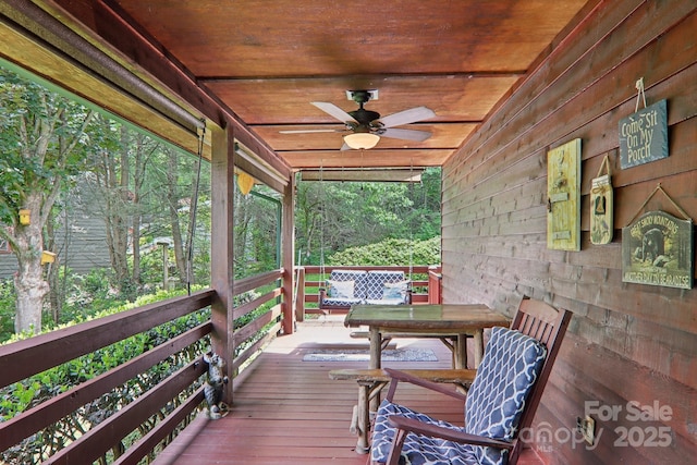 457 Shady Ridge Rd, Waynesville, NC 28785 - wooden deck featuring ceiling fan and outdoor dining space