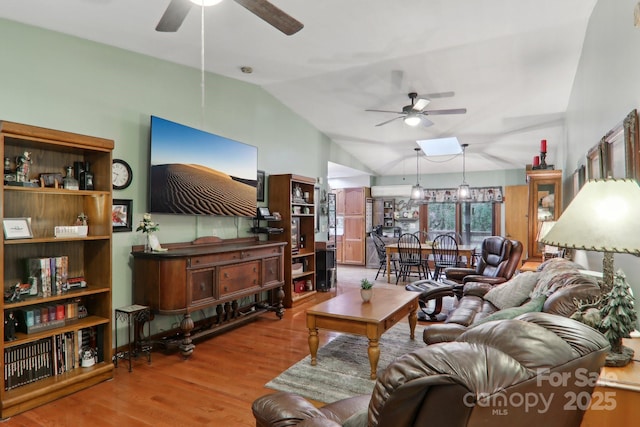 457 Shady Ridge Rd, Waynesville, NC 28785 - living room featuring ceiling fan, lofted ceiling, and wood finished floors