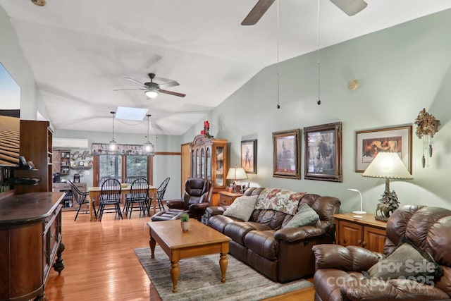 457 Shady Ridge Rd, Waynesville, NC 28785 - living room with ceiling fan, vaulted ceiling, and light wood finished floors