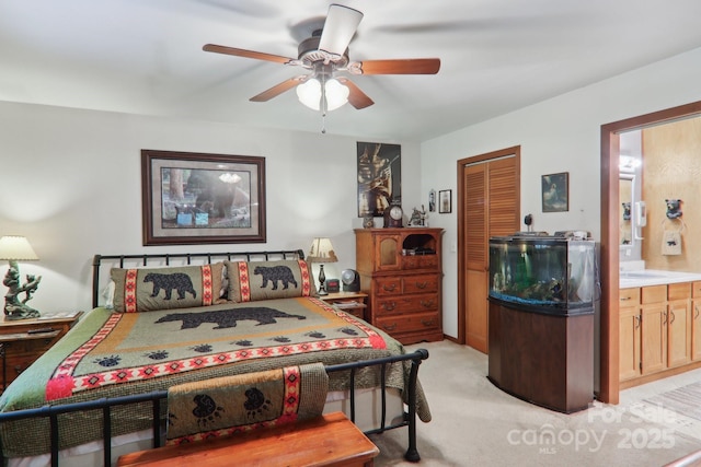 457 Shady Ridge Rd, Waynesville, NC 28785 - bedroom featuring light carpet, ensuite bathroom, a ceiling fan, and a closet