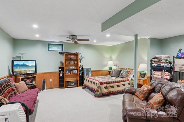 457 Shady Ridge Rd, Waynesville, NC 28785 - bedroom with carpet flooring, a wainscoted wall, recessed lighting, wood walls, and a ceiling fan