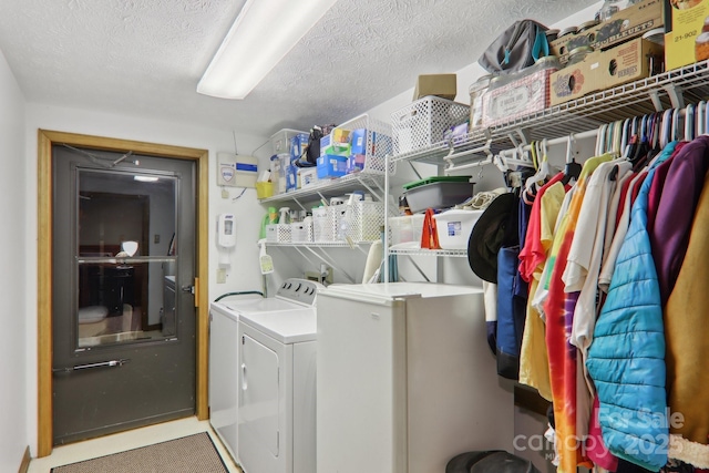 457 Shady Ridge Rd, Waynesville, NC 28785 - washroom with a textured ceiling and independent washer and dryer