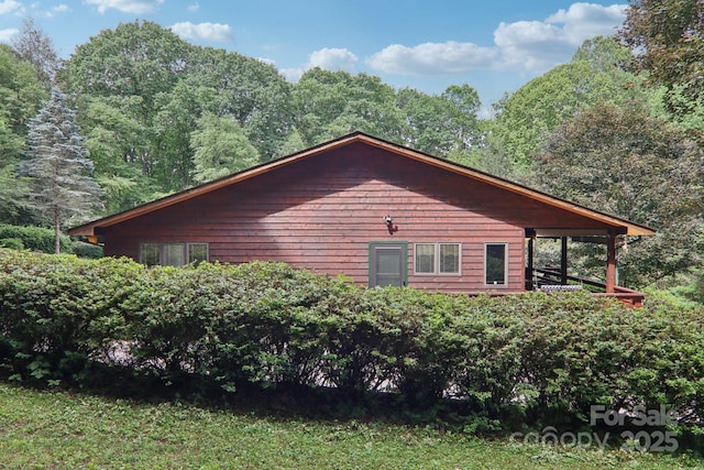 457 Shady Ridge Rd, Waynesville, NC 28785 - view of side of home featuring a view of trees