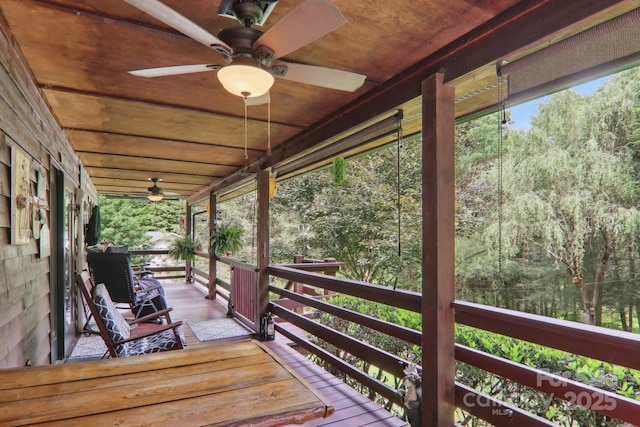 457 Shady Ridge Rd, Waynesville, NC 28785 - wooden deck featuring ceiling fan and a wooded view