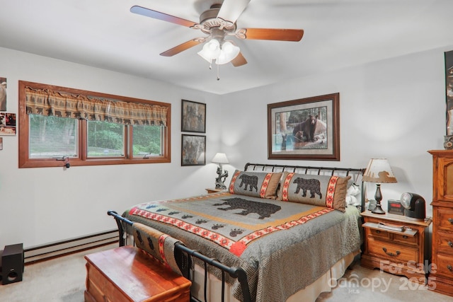 457 Shady Ridge Rd, Waynesville, NC 28785 - bedroom with light colored carpet, baseboard heating, and ceiling fan