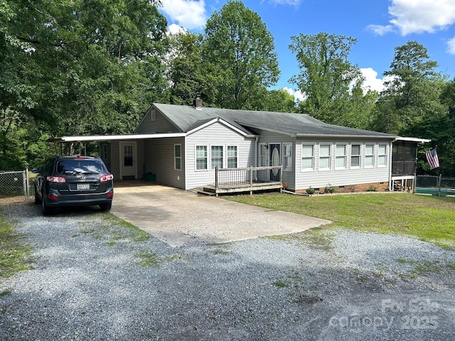 259 Oakland Heights Rd, Forest City, NC 28043 - ranch-style house featuring driveway, an attached carport, crawl space, a wooden deck, and a chimney