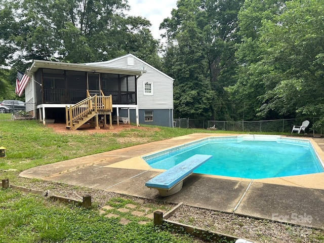 259 Oakland Heights Rd, Forest City, NC 28043 - view of swimming pool with a sunroom, a diving board, stairway, and a patio