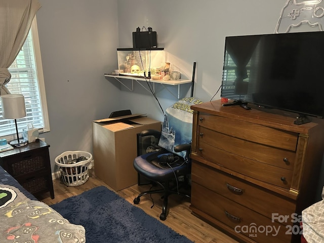 259 Oakland Heights Rd, Forest City, NC 28043 - bedroom featuring wood finished floors and an office area