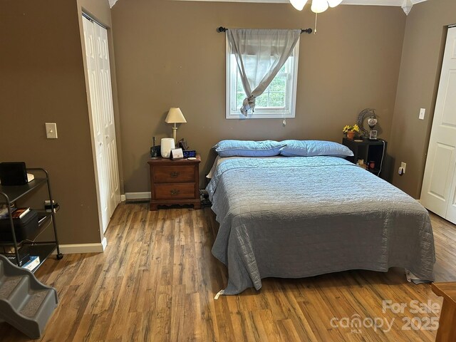 259 Oakland Heights Rd, Forest City, NC 28043 - bedroom with wood finished floors, baseboards, and a closet